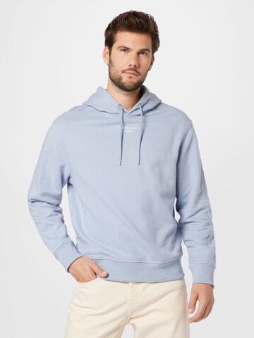 Calvin Klein JeansSweater majica - plava boja: prednji dio