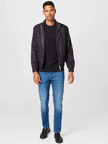 Han Kjøbenhavn Between-season jacket 'Track' in Black