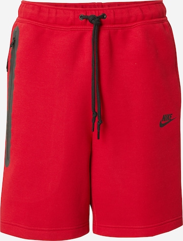 Nike Sportswear - Pantalón 'TCH FLC' en rojo: frente