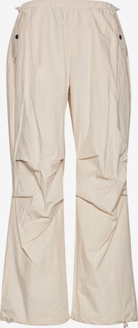 Karl Kani Lużny krój Spodnie w kolorze beżowy: przód