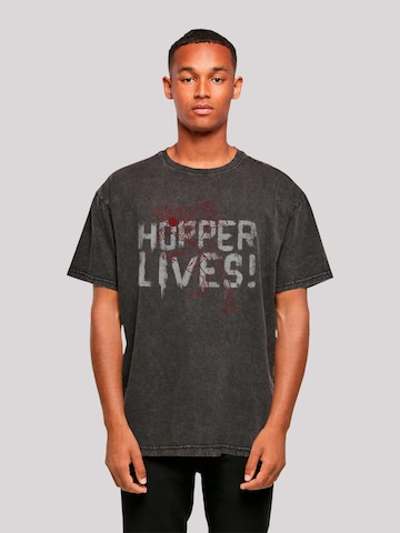 T-Shirt 'Stranger Things Hoppers Live Netflix TV Series' F4NT4STIC en noir : devant