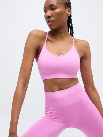 NIKE Korzet Športová podprsenka - Ružová