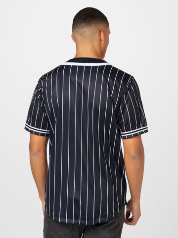 Karl Kani T-Shirt 'Serif Pinstripe' in Schwarz