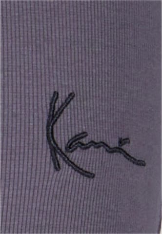 Flared Pantaloni di Karl Kani in grigio