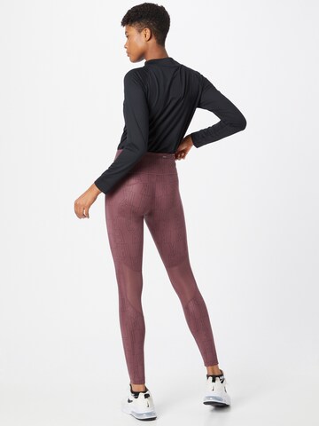 Skinny Pantalon de sport NIKE en rouge