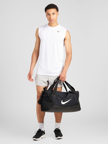 T-Shirt fonctionnel NIKE en blanc