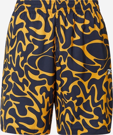 Pantalon de sport Reebok en jaune : devant