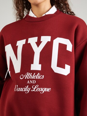 Sweat-shirt 'Tabea' ABOUT YOU en rouge