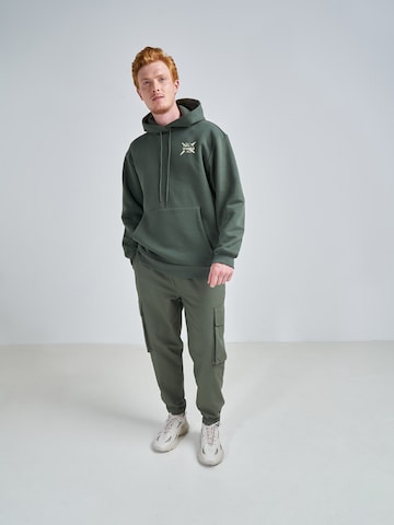 ABOUT YOU x Swalina&Linus Regular Cargo Pants 'Marlo' in Green