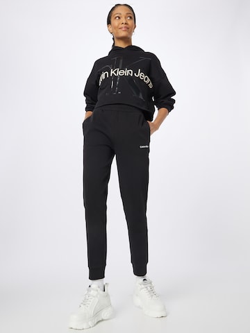 Calvin Klein - Tapered Pantalón en negro