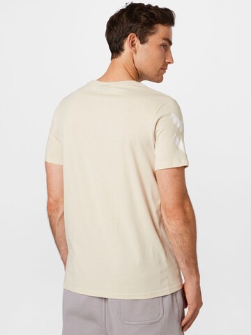 Hummel Funkční tričko 'Legacy' – béžová