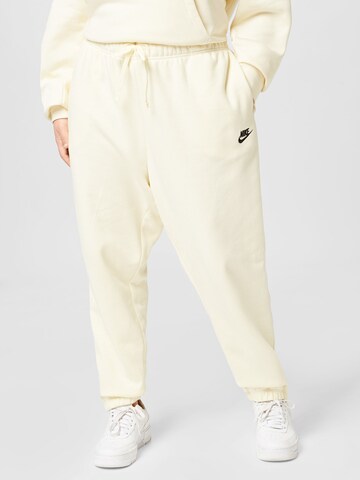 Nike Sportswear Tapered Sportbyxa i vit: framsida