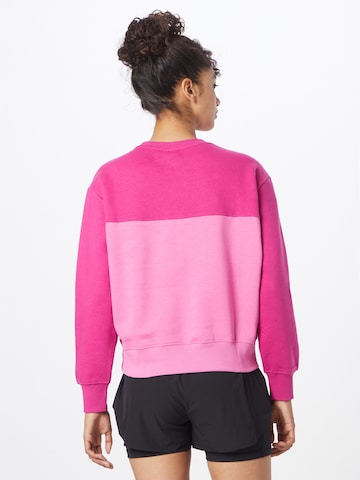 Champion Authentic Athletic Apparel Sweatshirt in Pink