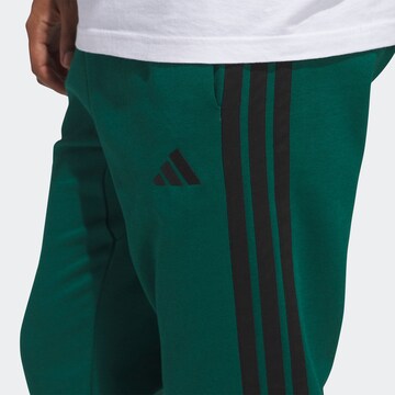 ADIDAS SPORTSWEAR Tapered Sports trousers 'Essentials' in Green