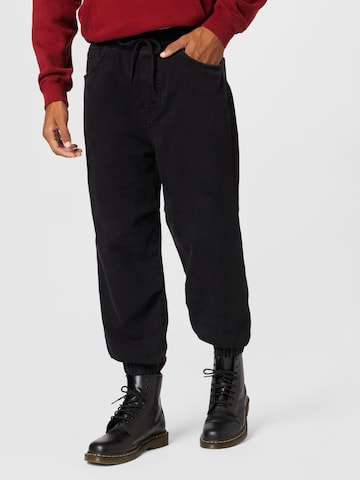 ABOUT YOU Tapered Jeans 'Harun' in Zwart: voorkant