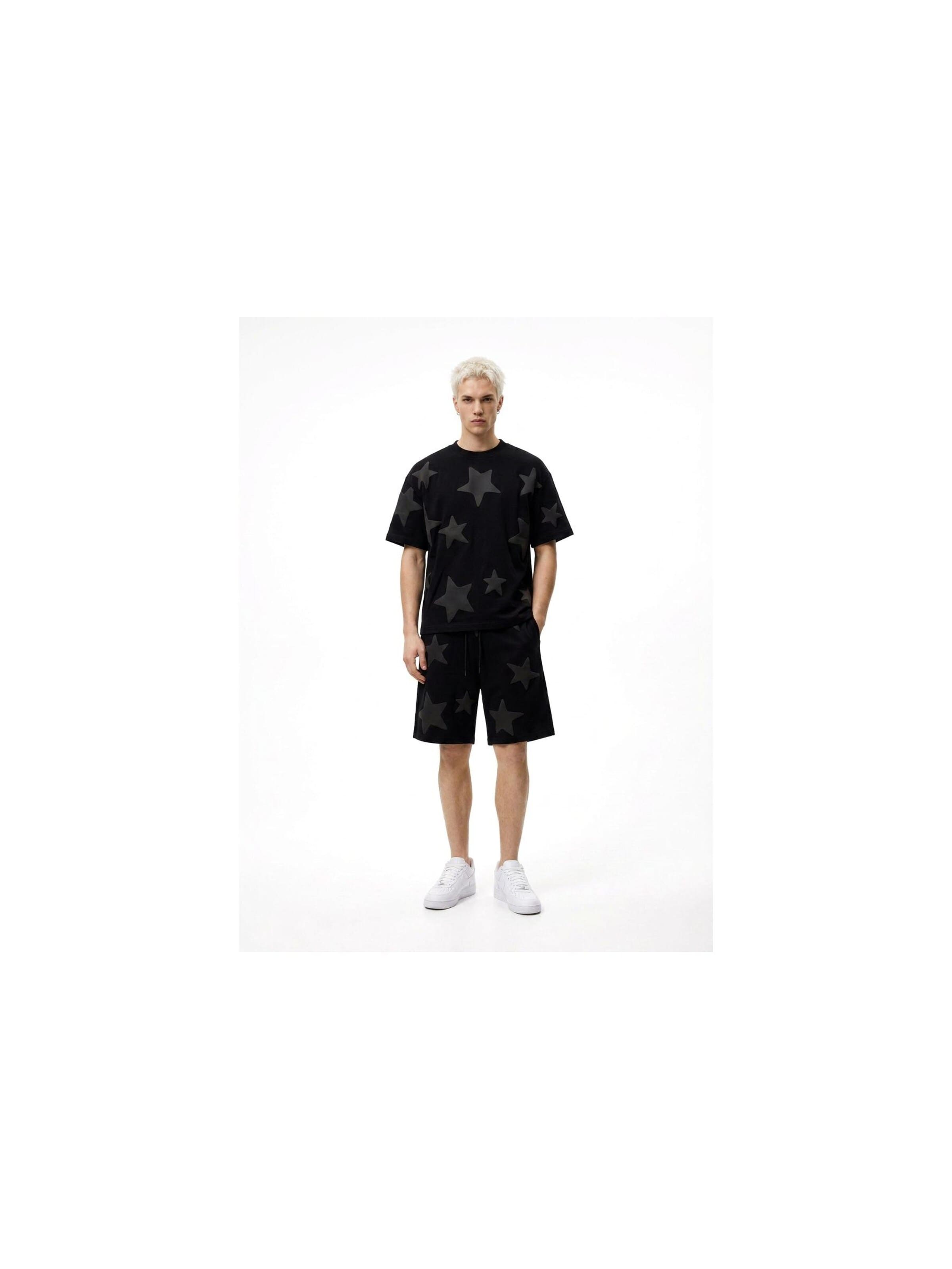 OVER STREET - Camiseta 'Camiseta negra falling stars oversized tee' en negro