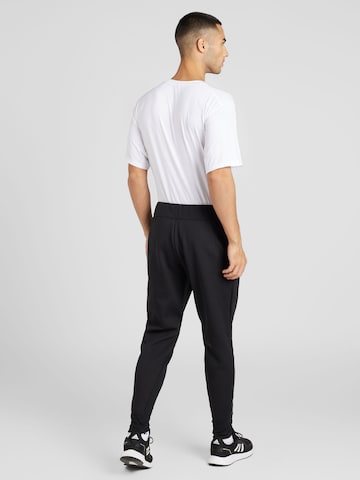 ADIDAS SPORTSWEAR Tapered Sports trousers 'Z.N.E.' in Black