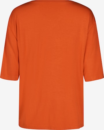 T-shirt Skiny en orange