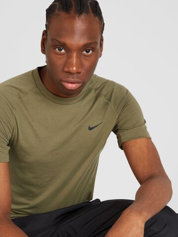 NIKE Функциональная футболка 'FLEX REP' в Зеленый