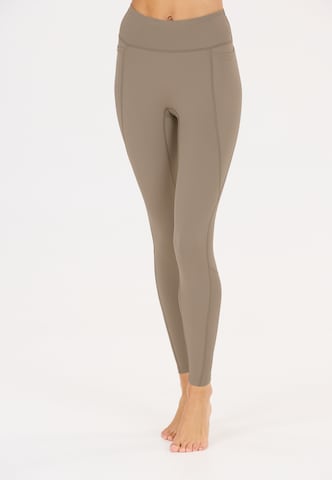 Athlecia Slim fit Sports trousers 'Aliya V2' in Beige: front