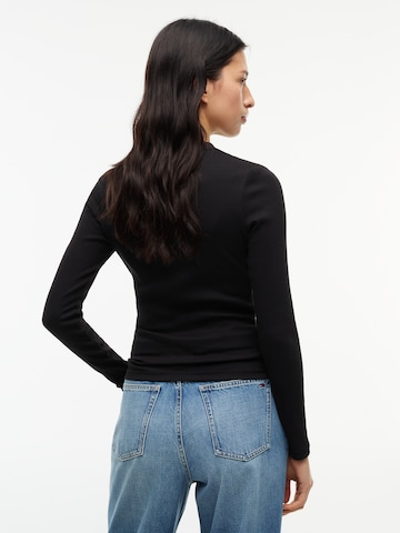 Maglietta 'ESS' di Tommy Jeans in nero