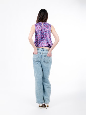 Influencer - Top en Mezcla de colores