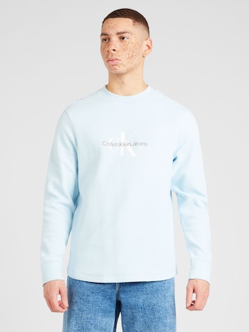 Calvin Klein Jeans T-shirt i blå: framsida