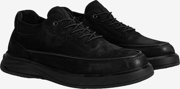 Slip on 'Trainer' Desa en noir : devant