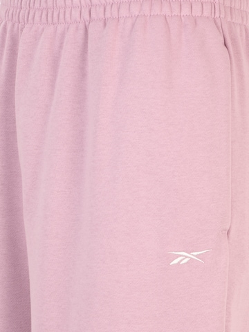 Effilé Pantalon de sport Reebok en rose