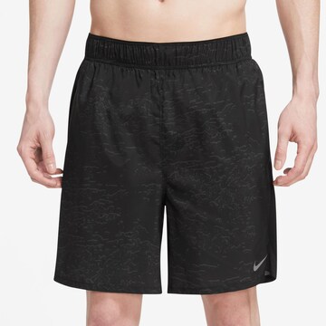 NIKE Regular Workout Pants 'Challenger' in Black