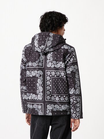 NAPAPIJRI Between-Season Jacket 'RAINFOREST' in Black