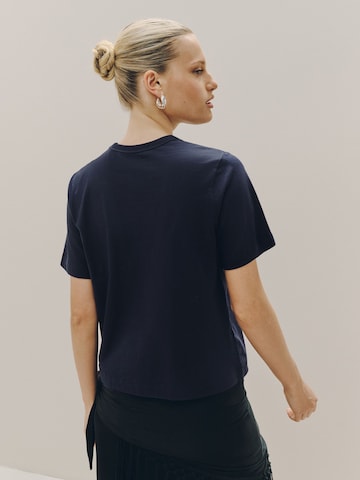 Tricou de la Next pe albastru