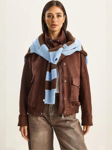 Bianco Lucci Tussenjas in Bruin