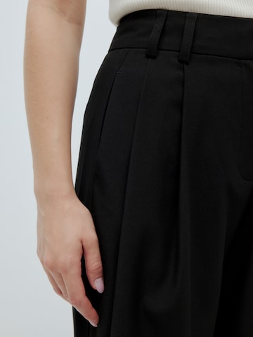 EDITED Lużny krój Spodnie 'Berte Tall' w kolorze czarny