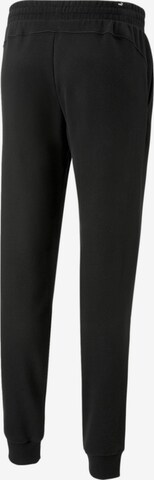 PUMA Tapered Sports trousers 'ELEVATED' in Black