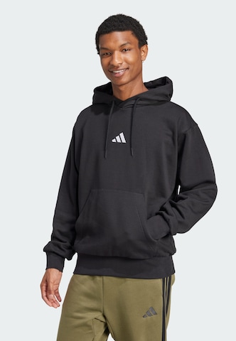 ADIDAS SPORTSWEAR Sports sweatshirt 'Feelcozy' in Black: front