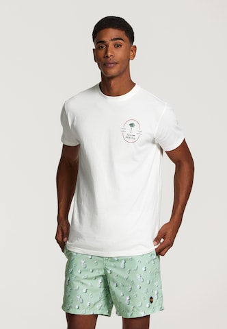 Shiwi T-shirt 'Tulum Palm' i vit: framsida