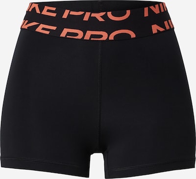 Pantaloni sport NIKE pe portocaliu somon / negru, Vizualizare produs