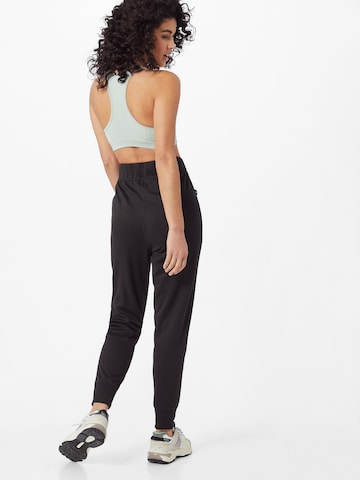 Effilé Pantalon de sport PUMA en noir