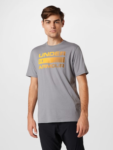 UNDER ARMOUR - Camisa funcionais 'Team Issue' em cinzento: frente