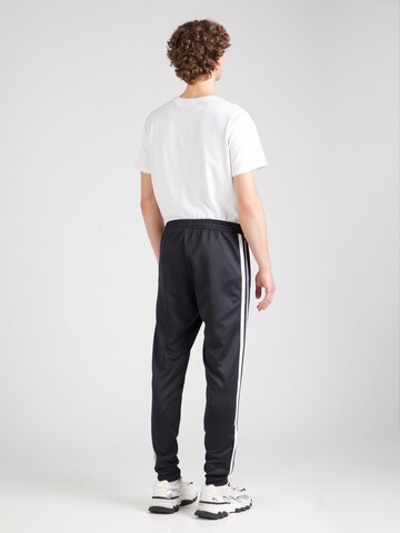 Champion Authentic Athletic Apparel Tapered Nadrág - fekete