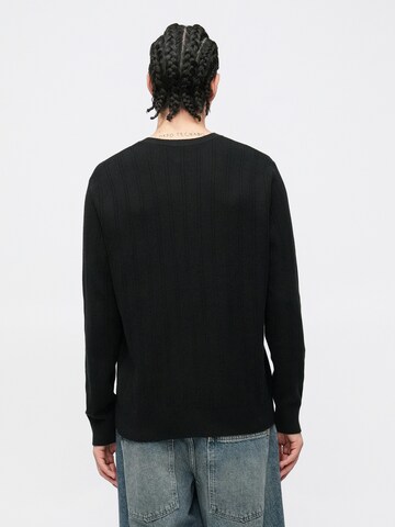 Pull-over GAP en noir : derrière
