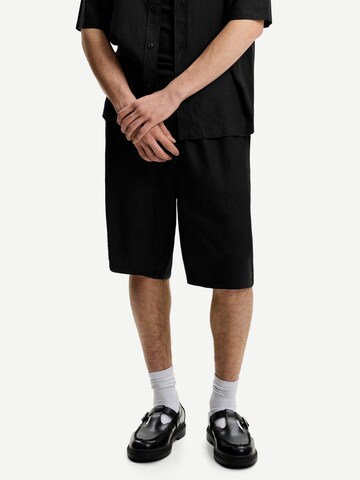 Bershka Loosefit Bukser i sort: forside