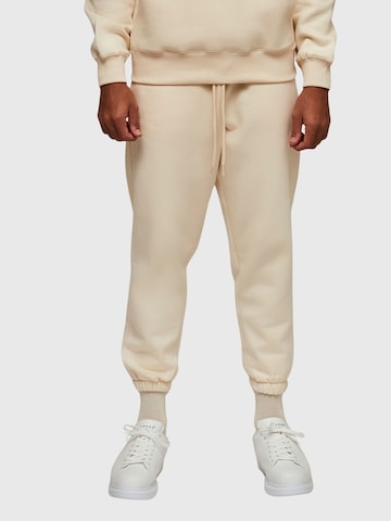 THE ODDS Regular Jogginghose 'Lounge Pants/ alphabet' in Beige: Vorderseite