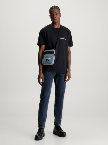 Calvin Klein Jeans Crossbody Bag in Blue