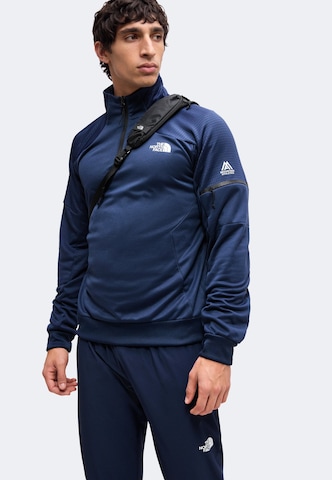 THE NORTH FACE Slimfit Športne hlače 'MOUNTAIN ATHLETICS USHBA' | modra barva