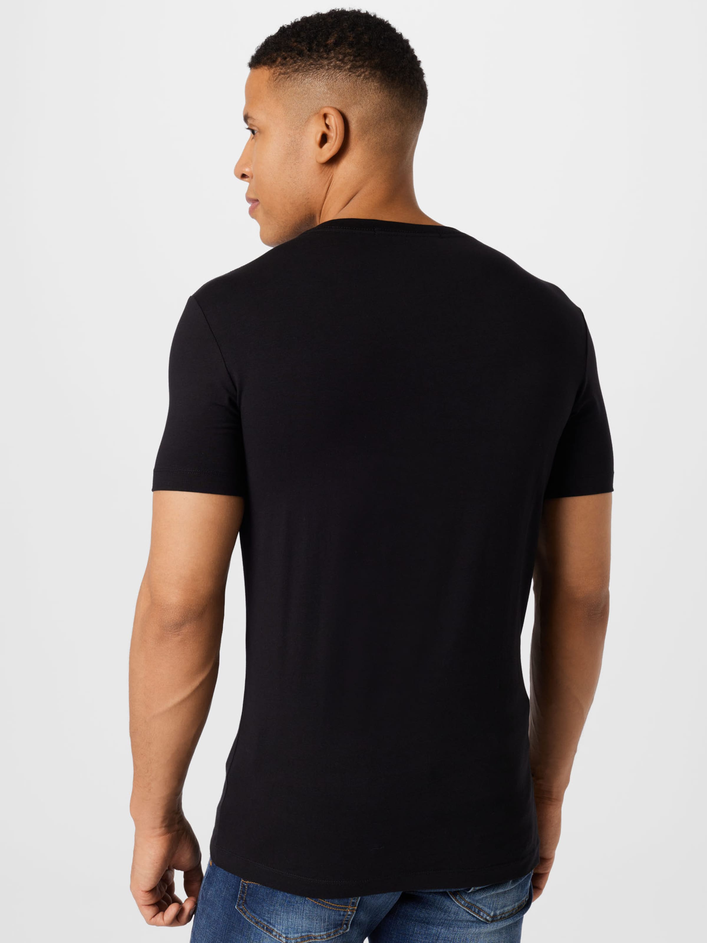 Männer Shirts Calvin Klein Jeans T-Shirt in Schwarz - AM89889