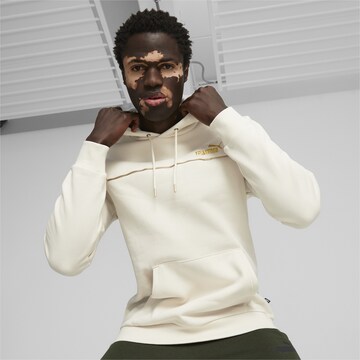 Sweat de sport 'ESS+ MINIMAL GOLD' PUMA en blanc : devant