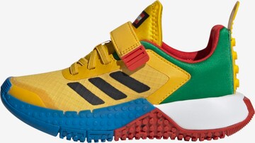 ADIDAS PERFORMANCE Athletic Shoes 'DNA x LEGO®' in Yellow: front