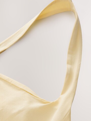 Haut Next en jaune